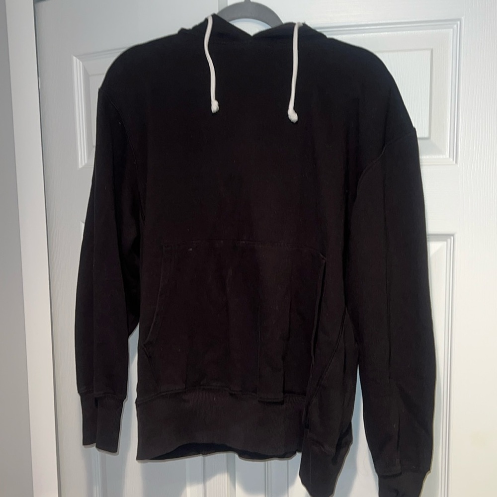 Black hoodie with white strings. Size XL. Worn once.